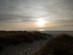 Düne und Meer im wunderschönen Sonnenuntergang am ersten Abend auf Langeoog